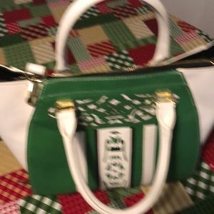 Brand new purse.  Never used. With strap
